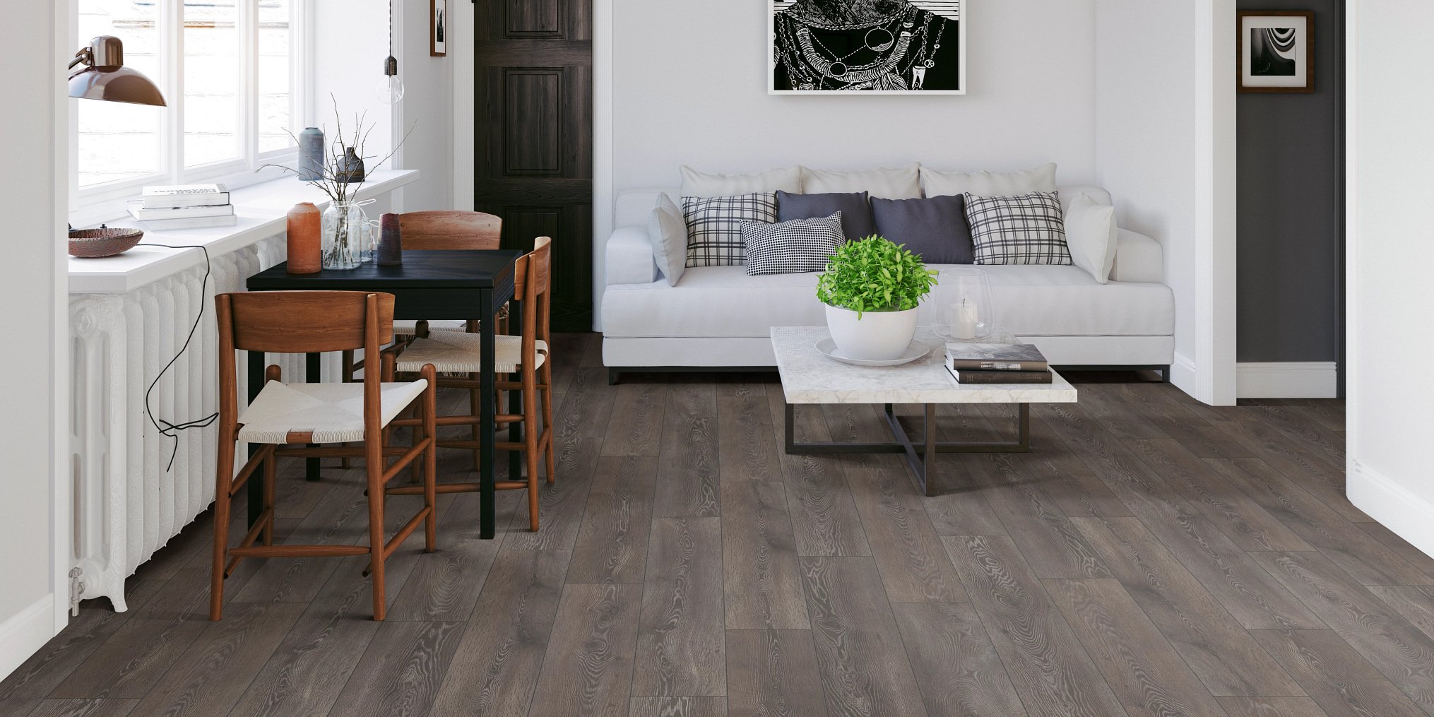 Living room with wood floor white couch desk and coffee table