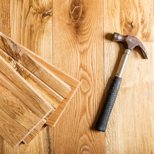 hammer on hardwood floor